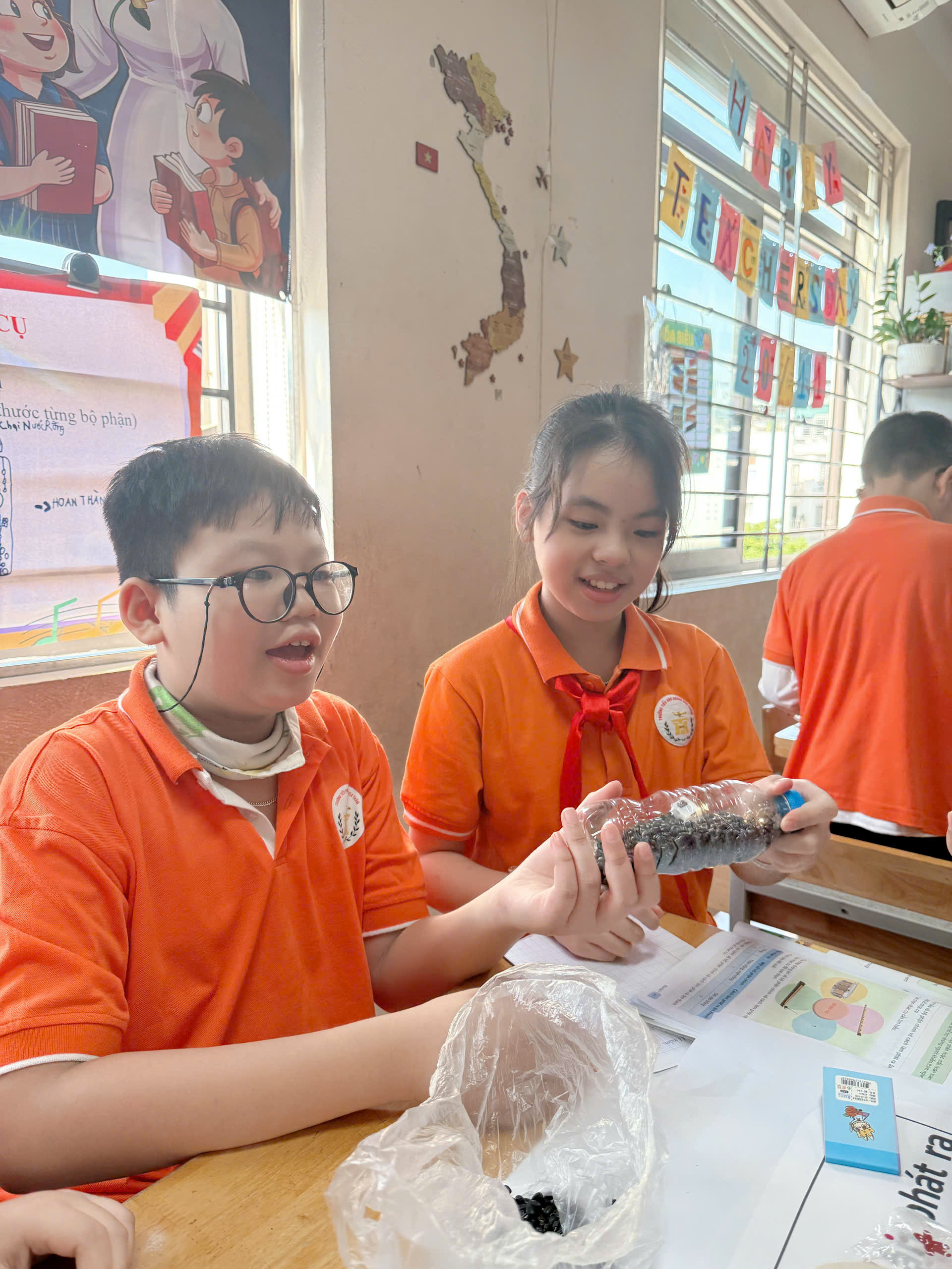 A child and child in orange shirts
AI-generated content may be incorrect.
