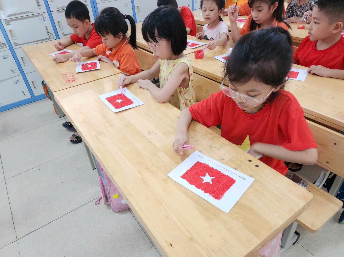 A group of children painting at desks

AI-generated content may be incorrect.