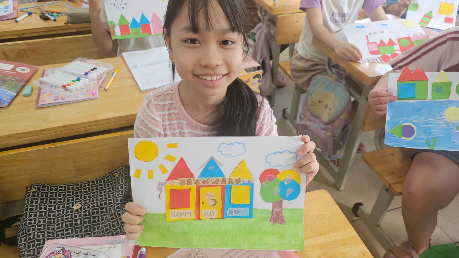 A child holding a drawing

AI-generated content may be incorrect.