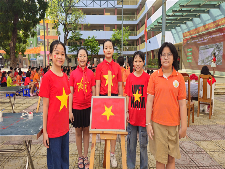 A group of people standing in front of a sign

AI-generated content may be incorrect.